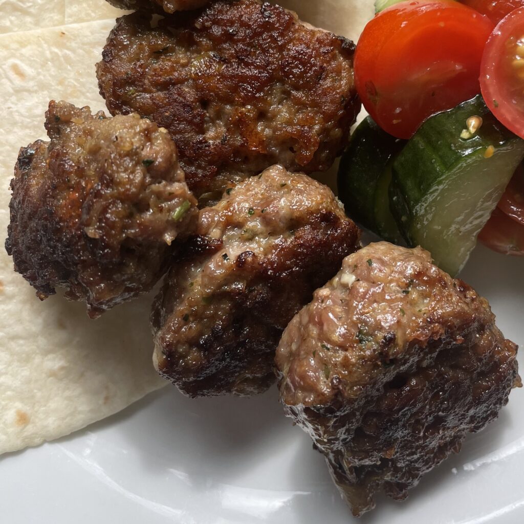 Spiced lamb kofta, flat bread & tzatziki Lifelong Learning Centres